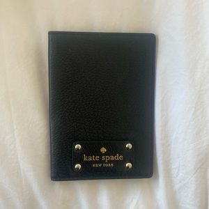 Used in good condition Kate Spade black leather passport holder